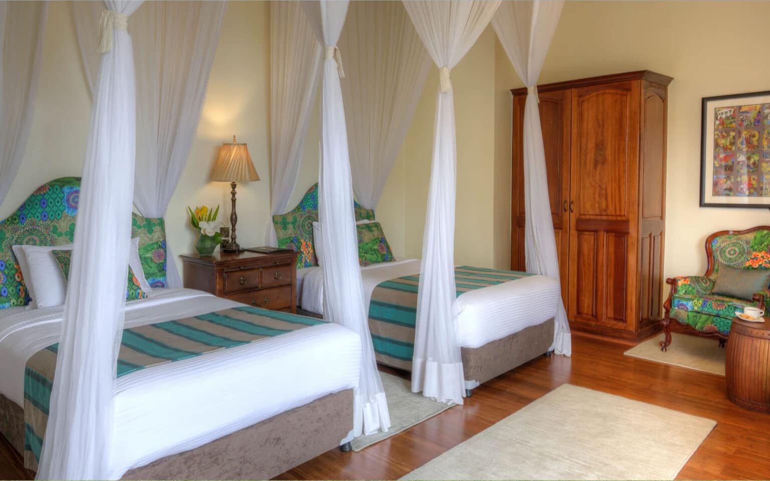 Cozy bedroom with twin beds and elegant wooden furniture