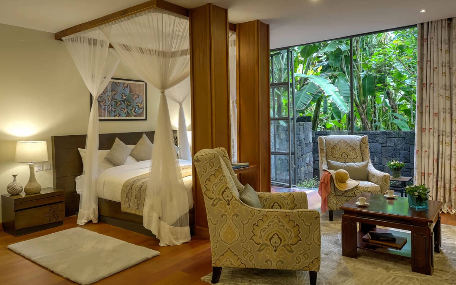 Luxurious hotel room with garden view and elegant furnishings
