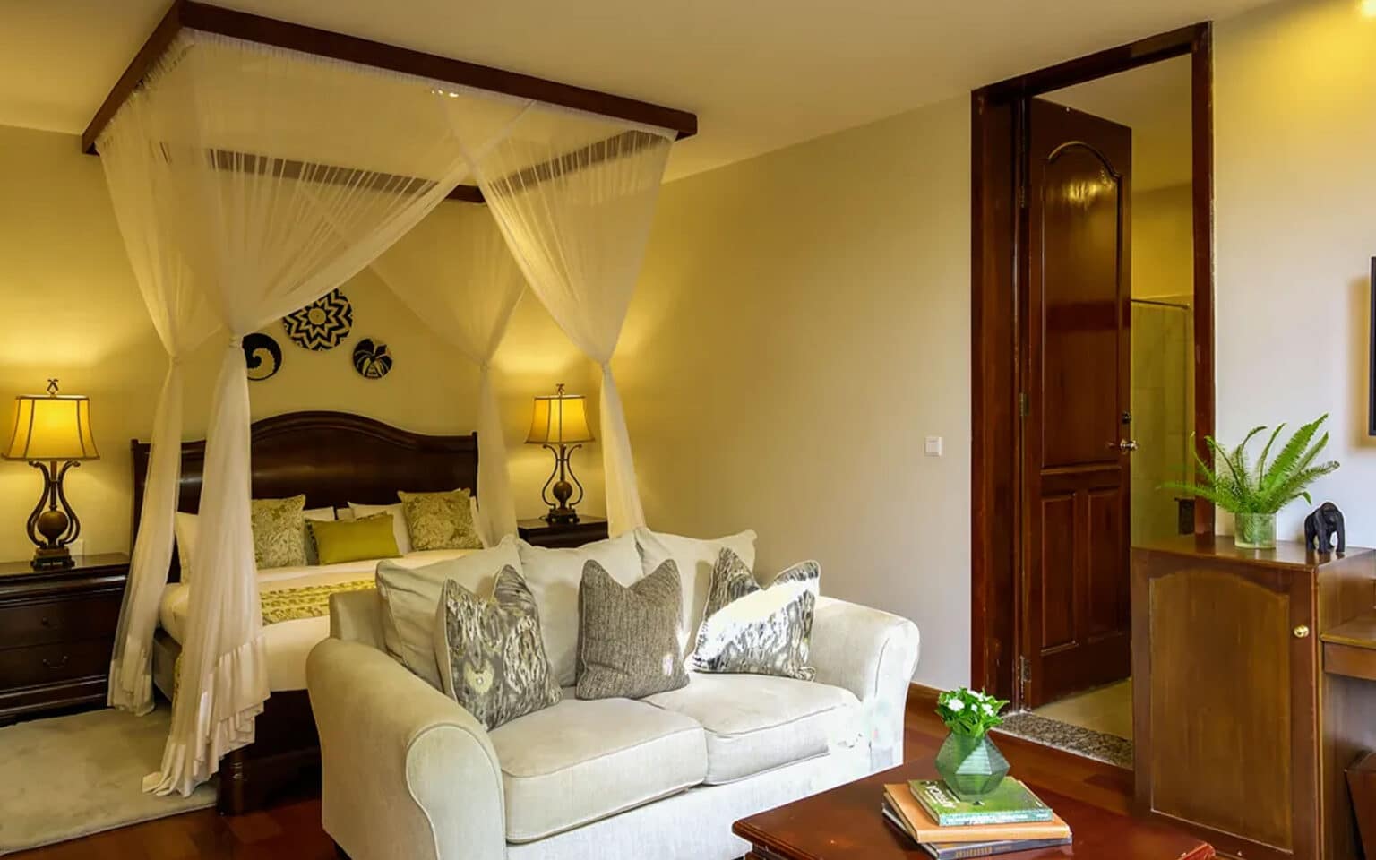 Luxurious bedroom with canopy bed and elegant decor