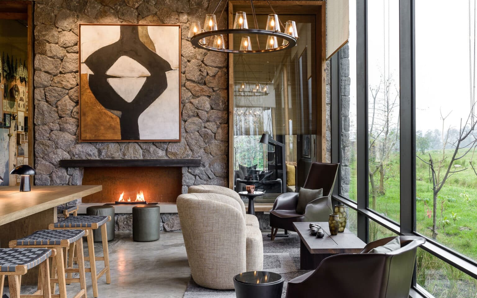 Luxurious living room with modern art and cozy fireplace scene